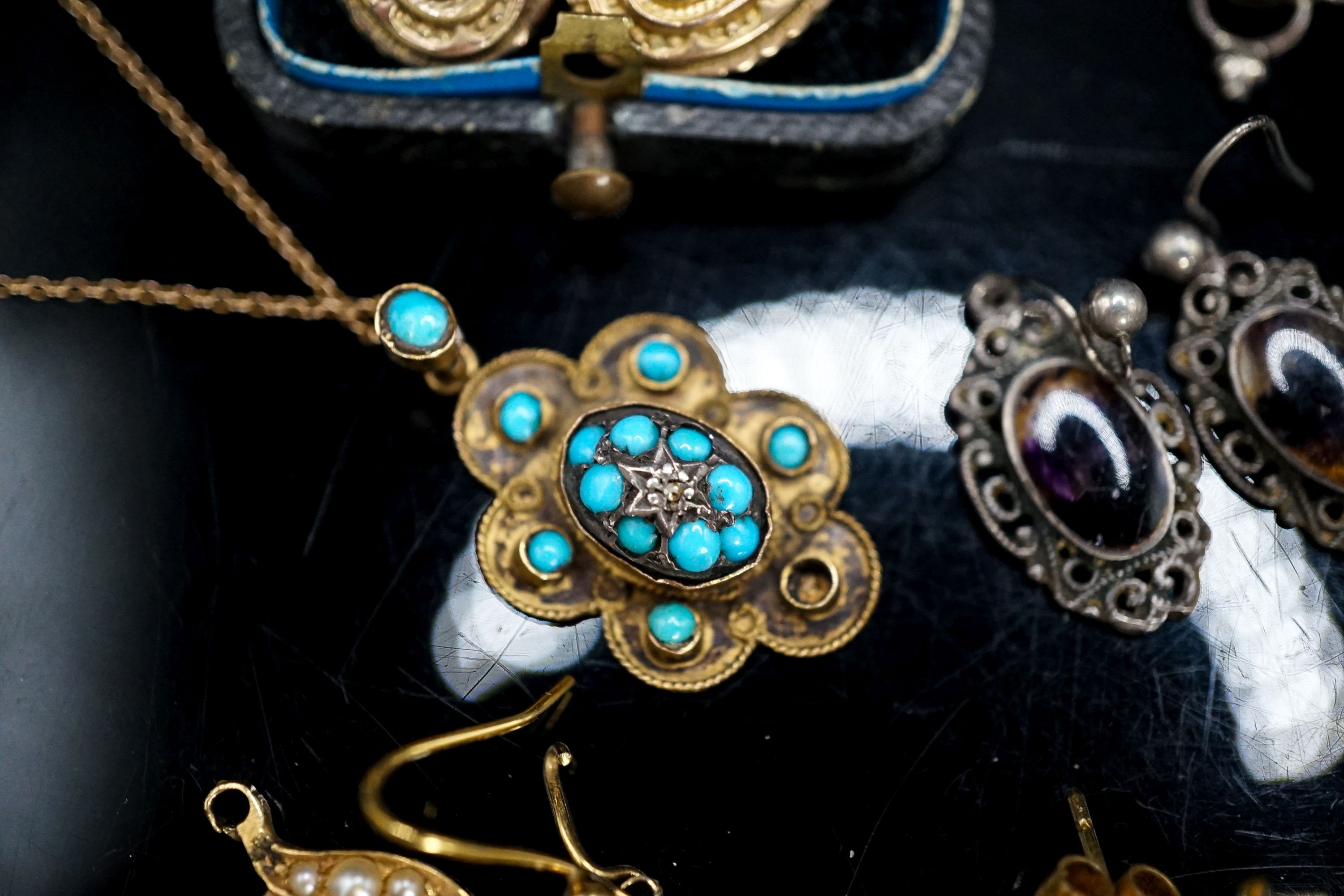 Eight assorted pairs of Victorian and later earrings including yellow metal and coral set, one odd earing and a pendant and two chains (some a.f.).